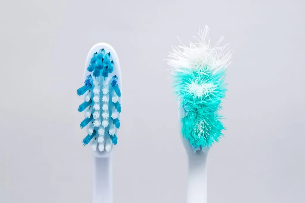 Used old and new toothbrush isolated on a white background